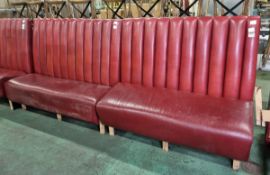 Red leather padded bench seating