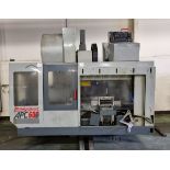 Bridgeport APC 600 CNC vertical machining centre with swarf conveyor, swarf skip, work bench