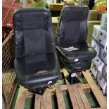 2x Black half leather captains chairs on pedestals