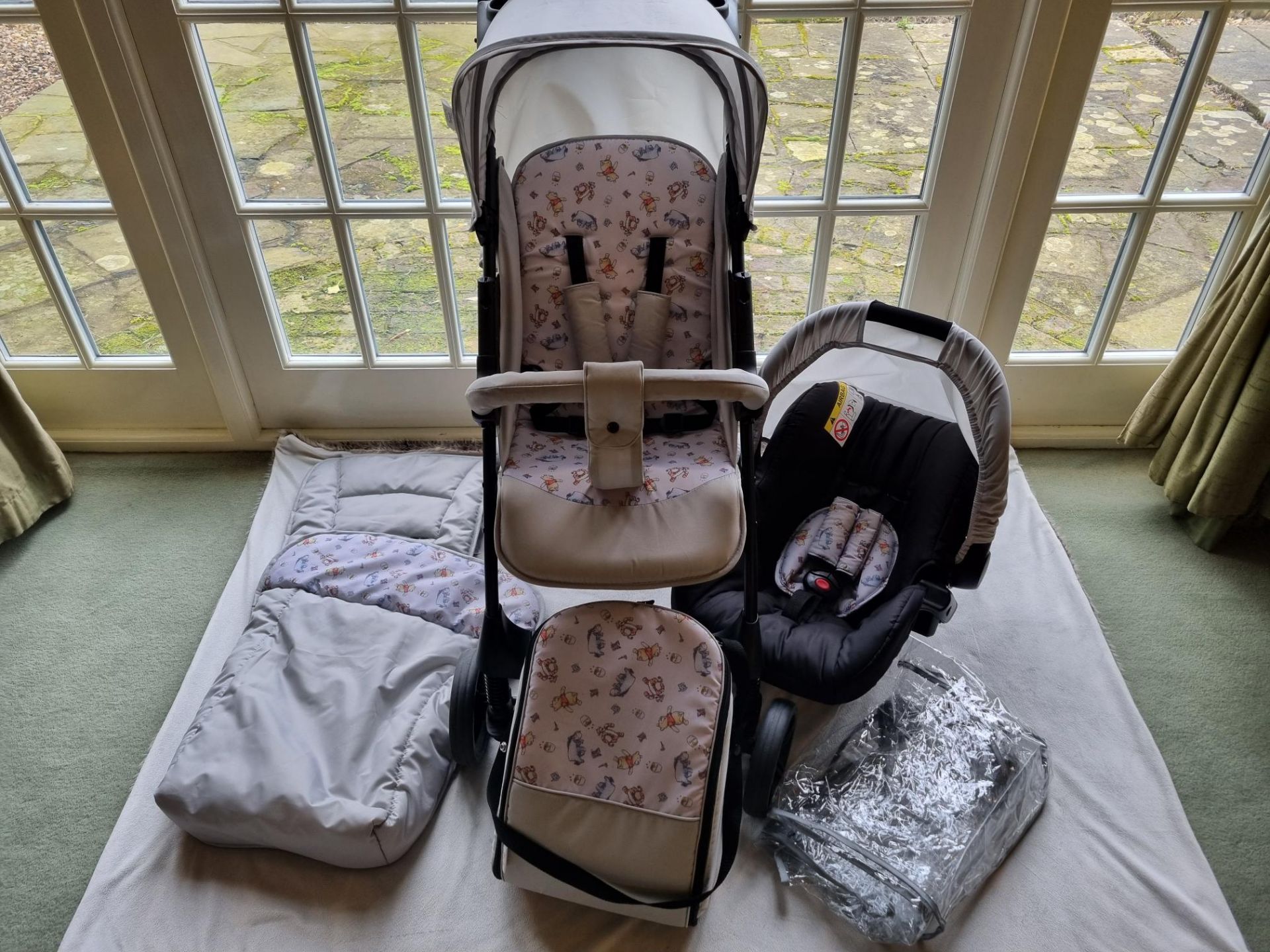 Hauck Disney Pushchair Travel System, Highchair, Tommee Tippee bottle warmer and case, playmat, toys - Image 2 of 24