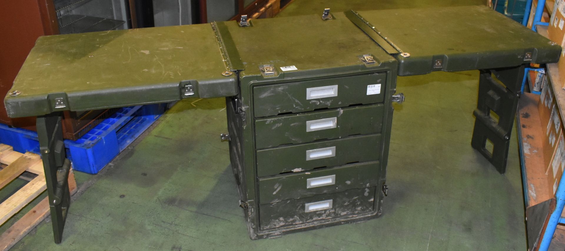 Green plastic military field desk in transit case