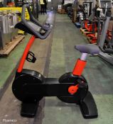 TechnoGym upright exercise bike - W 1185 x D 600 x H 1140mm