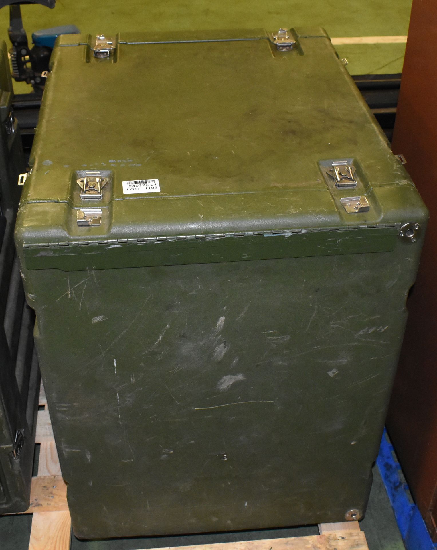 Green plastic military field desk in transit case