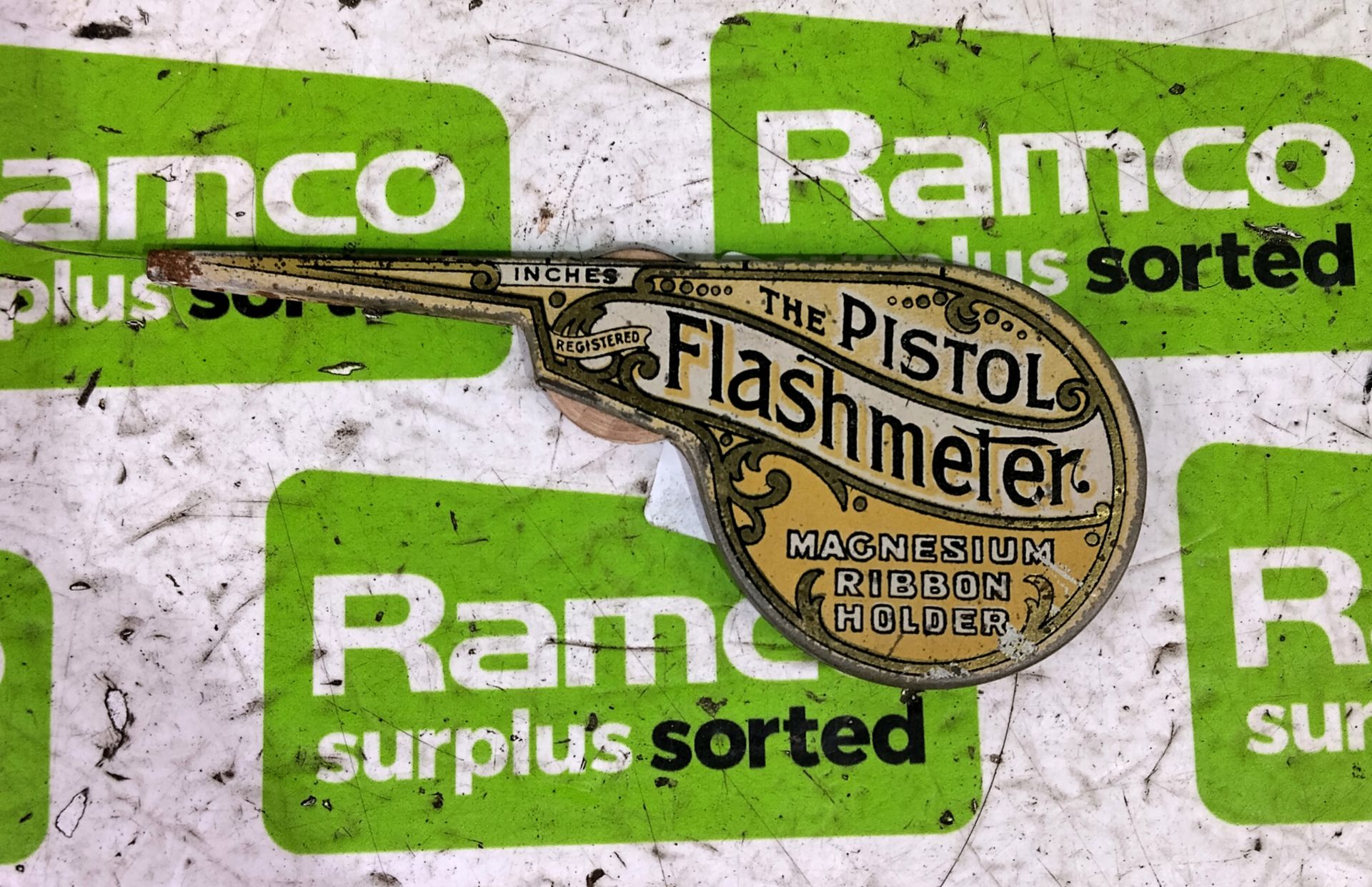 The pistol flashmeter - magnesium ribbon holder tin