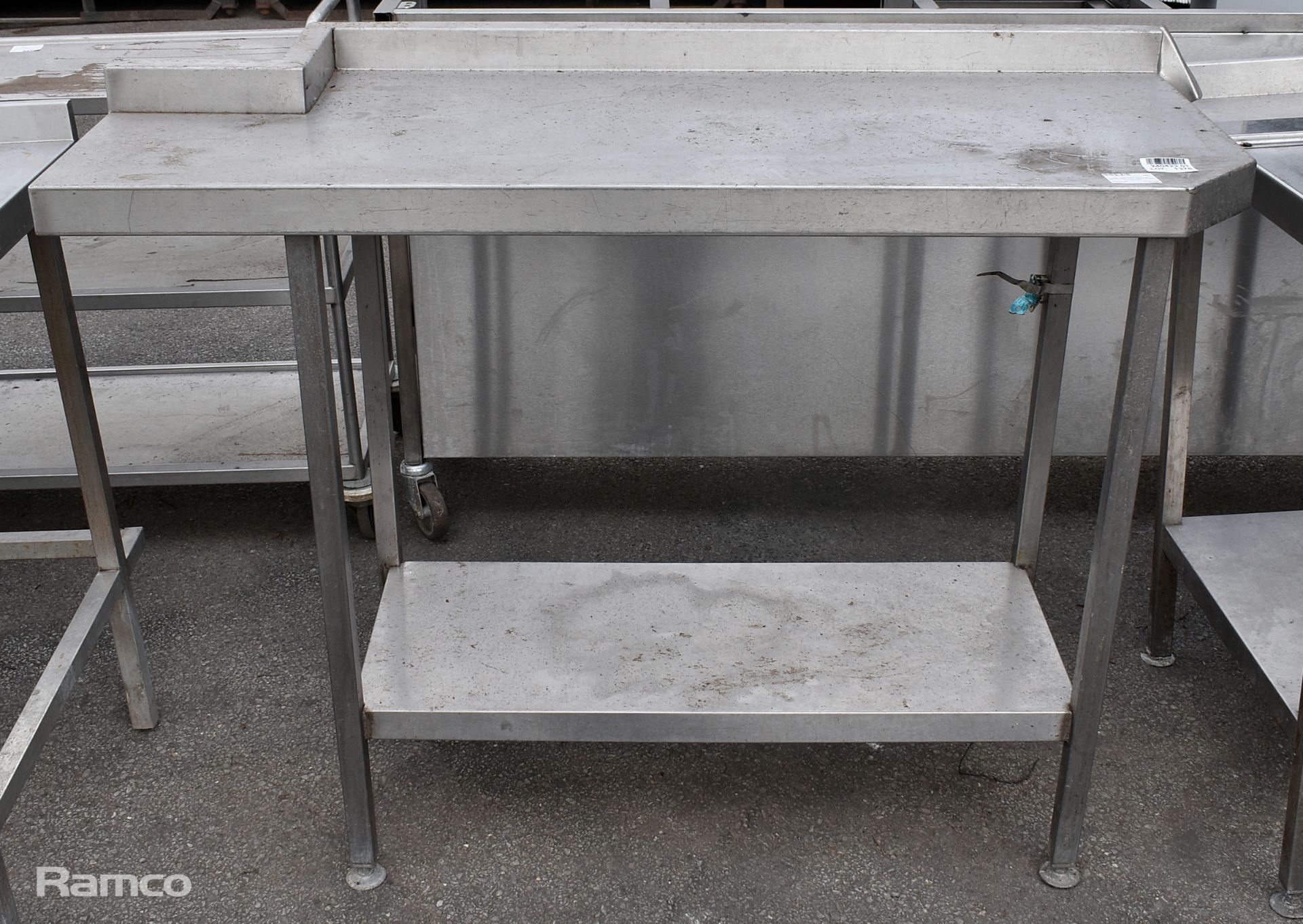 Stainless steel table with splashback - W 1250 x D 500 x H 900mm