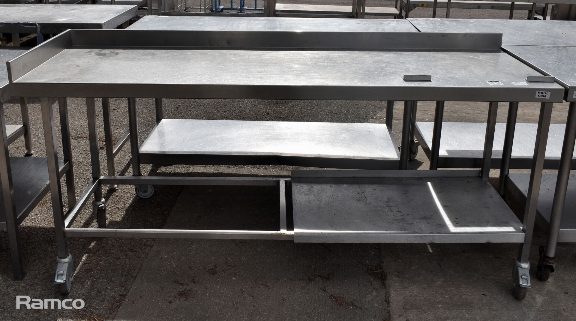 Stainless steel table with splashback on castors - W 1940 x D 700 x H 920mm