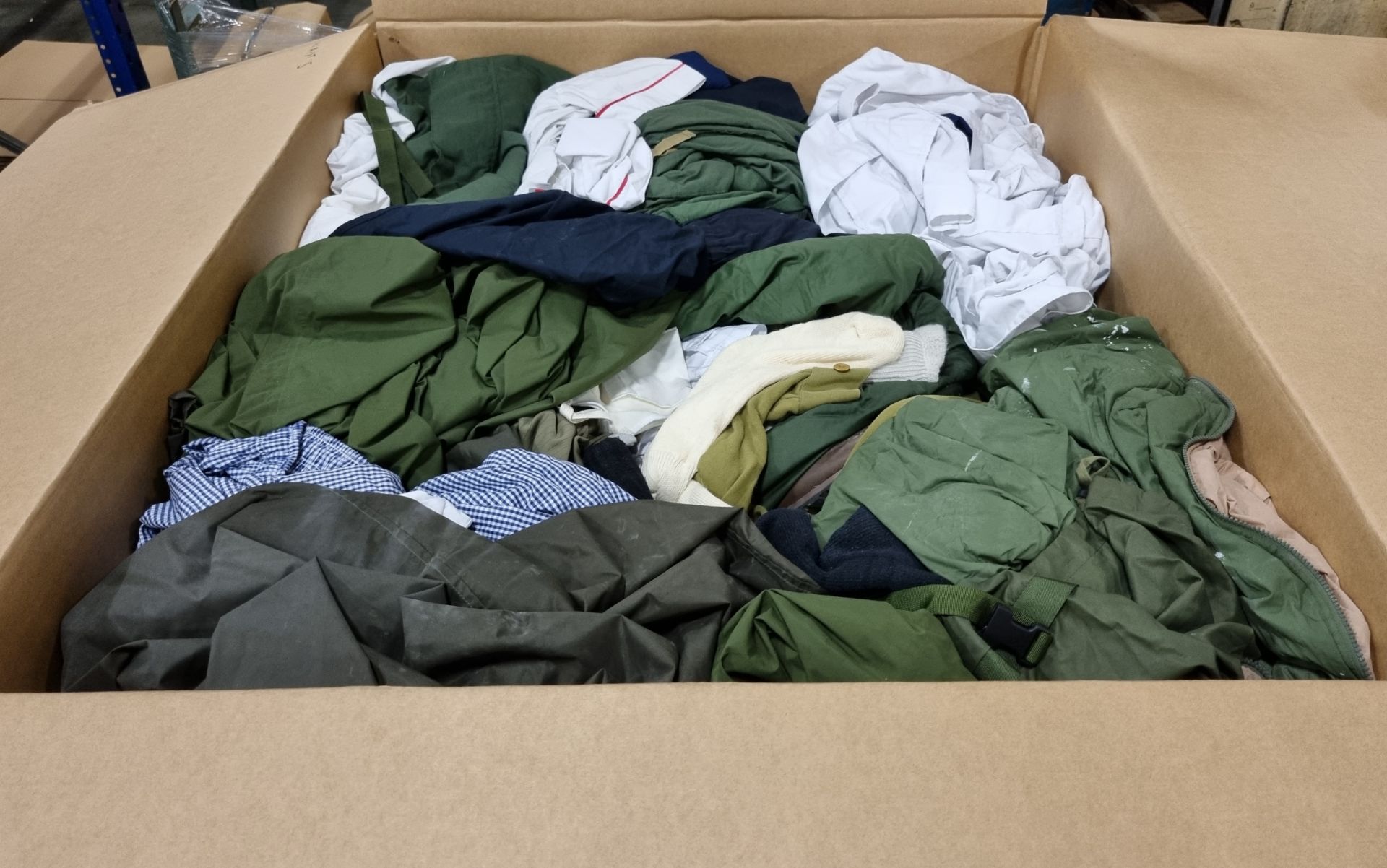 Various types of ex-military clothing The asset shows significant, irreparable damage - 170kg