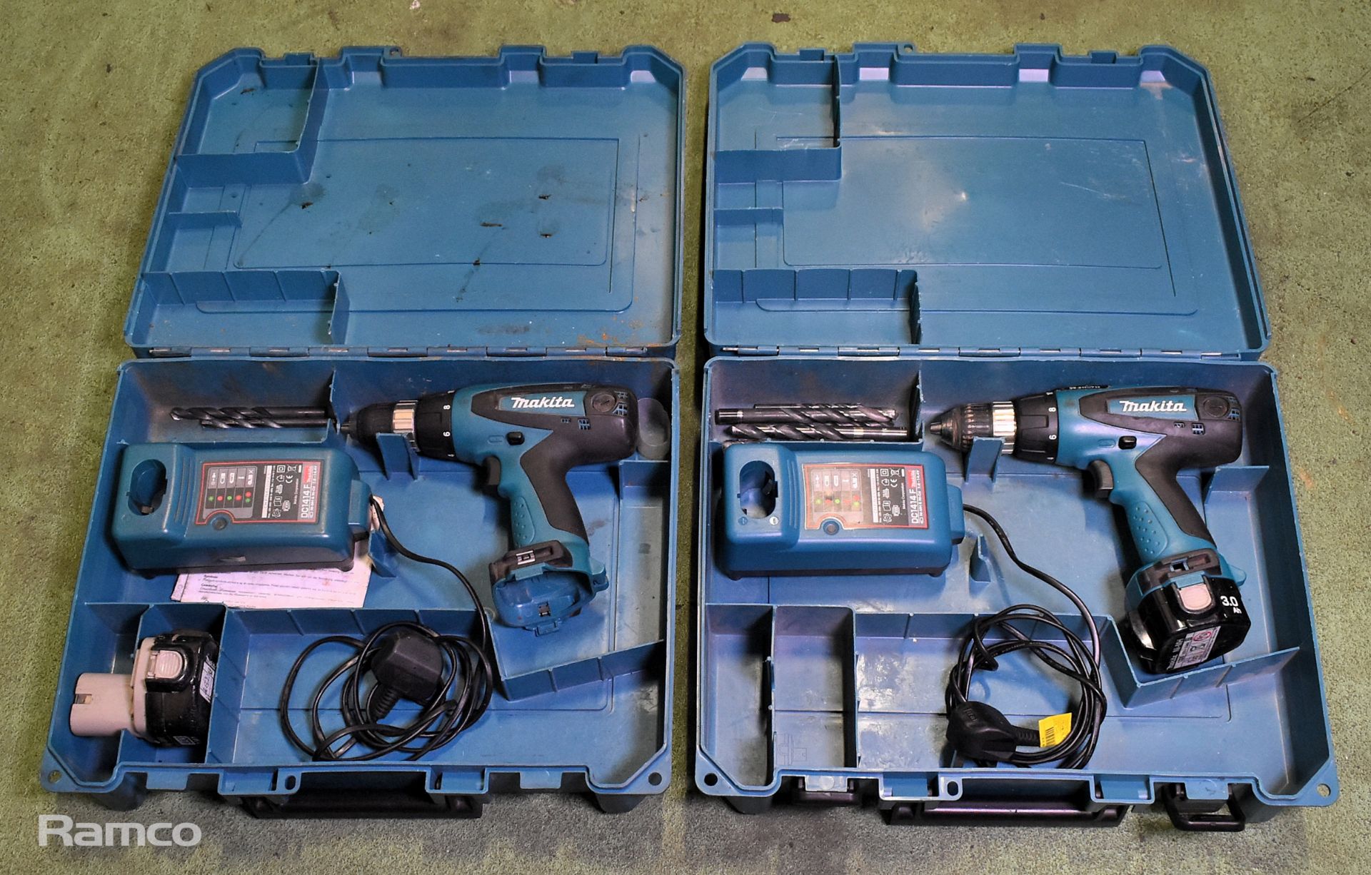 2x Makita 6317D cordless drills - DC1414F charger - 1x 12V battery - case