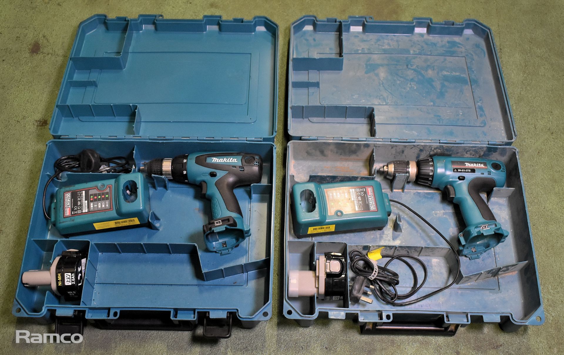 2x Makita 6317D cordless drills - DC1414T charger - 1x 12V battery - case