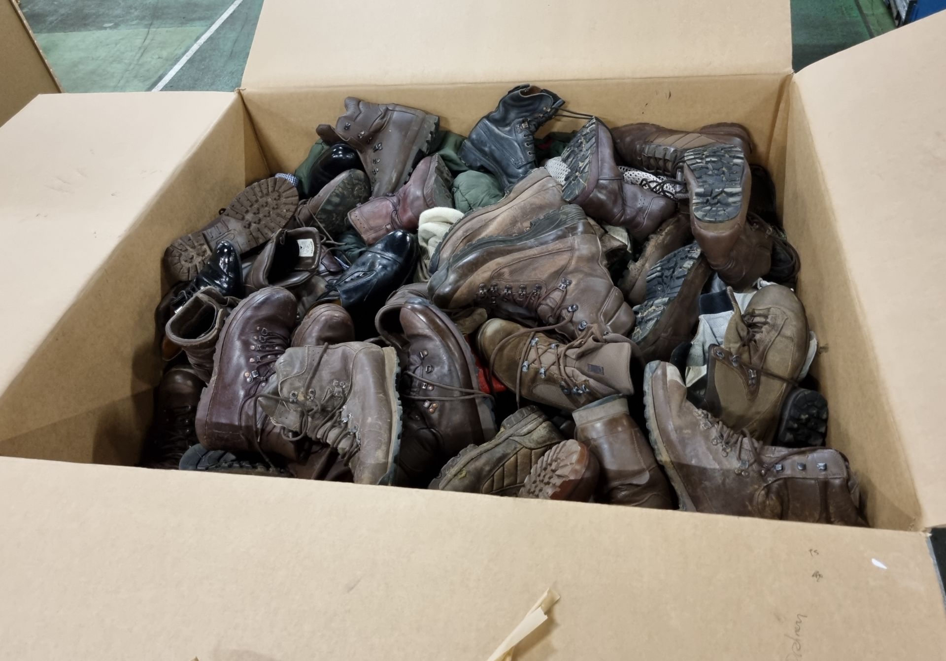 Various types of ex-military clothing The asset shows significant, irreparable damage - 148kg