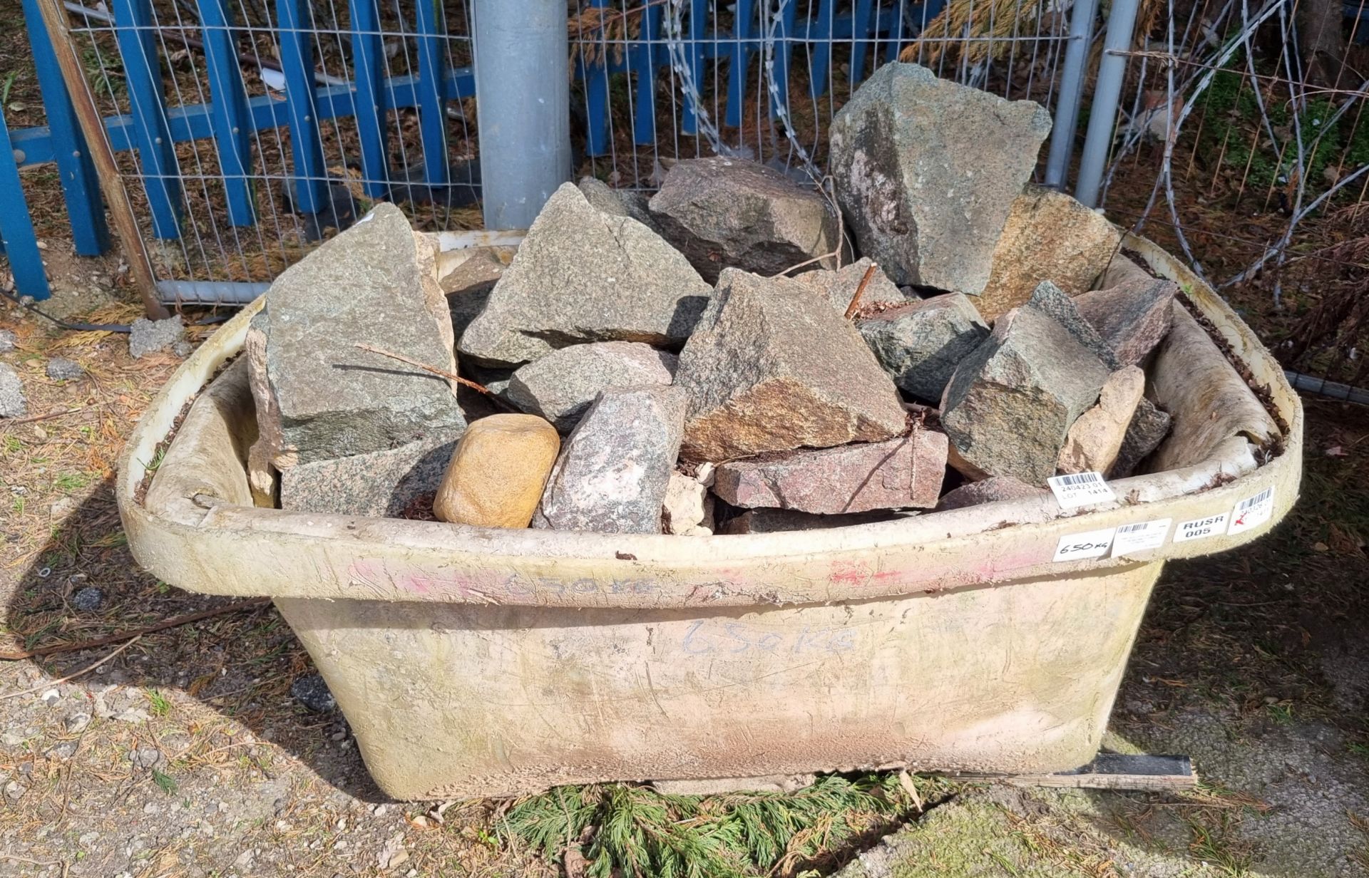 Green and Pink decorative granite stones in plastic container - 650kg