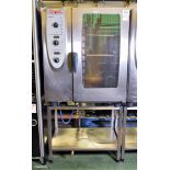 Rational CombiMaster CM 101G stainless steel 10 grid combi oven on stainless steel stand