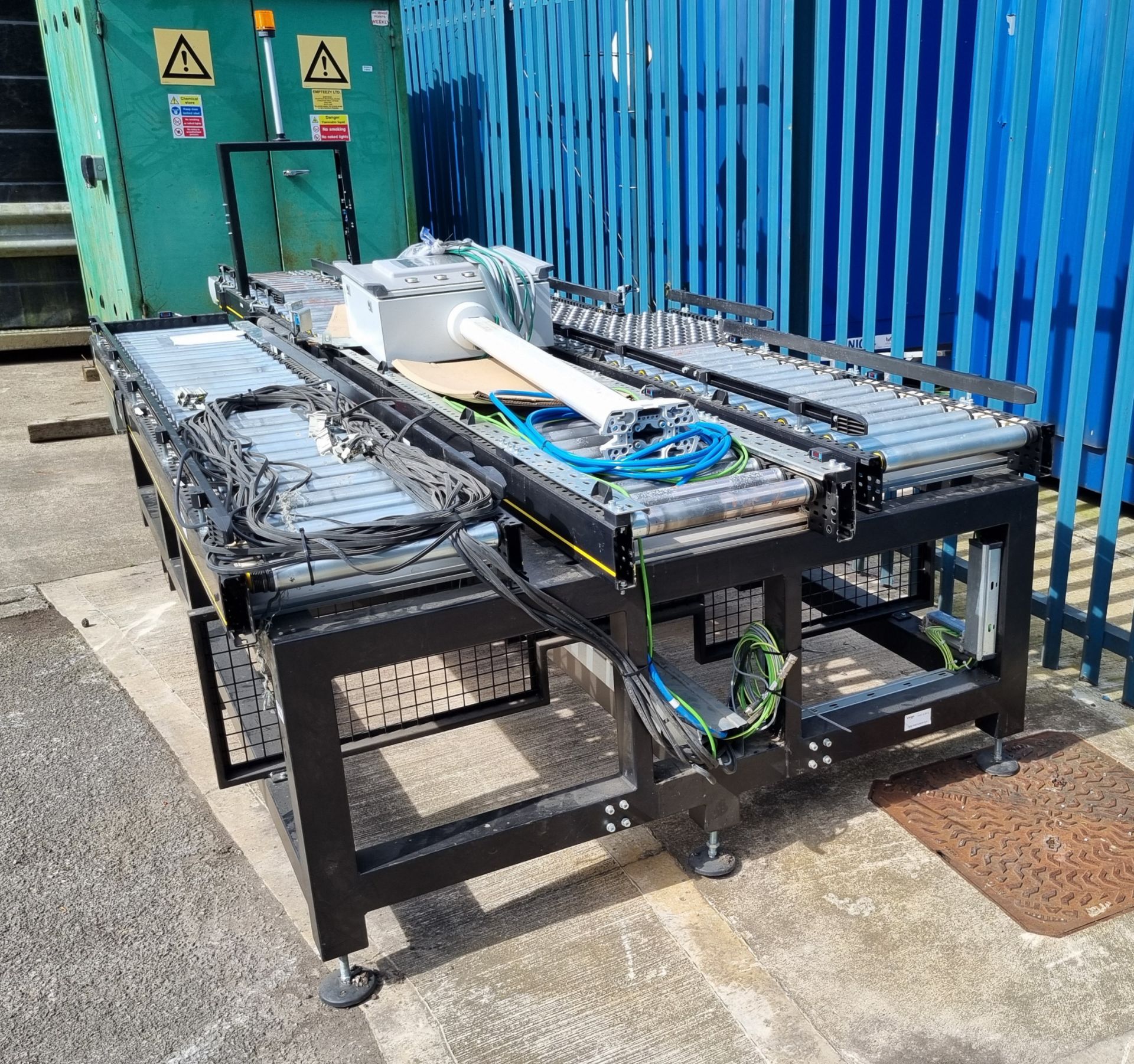 Interroll powered triple roller conveyor system with RM 8731 transfer plates and control panel - Image 2 of 14
