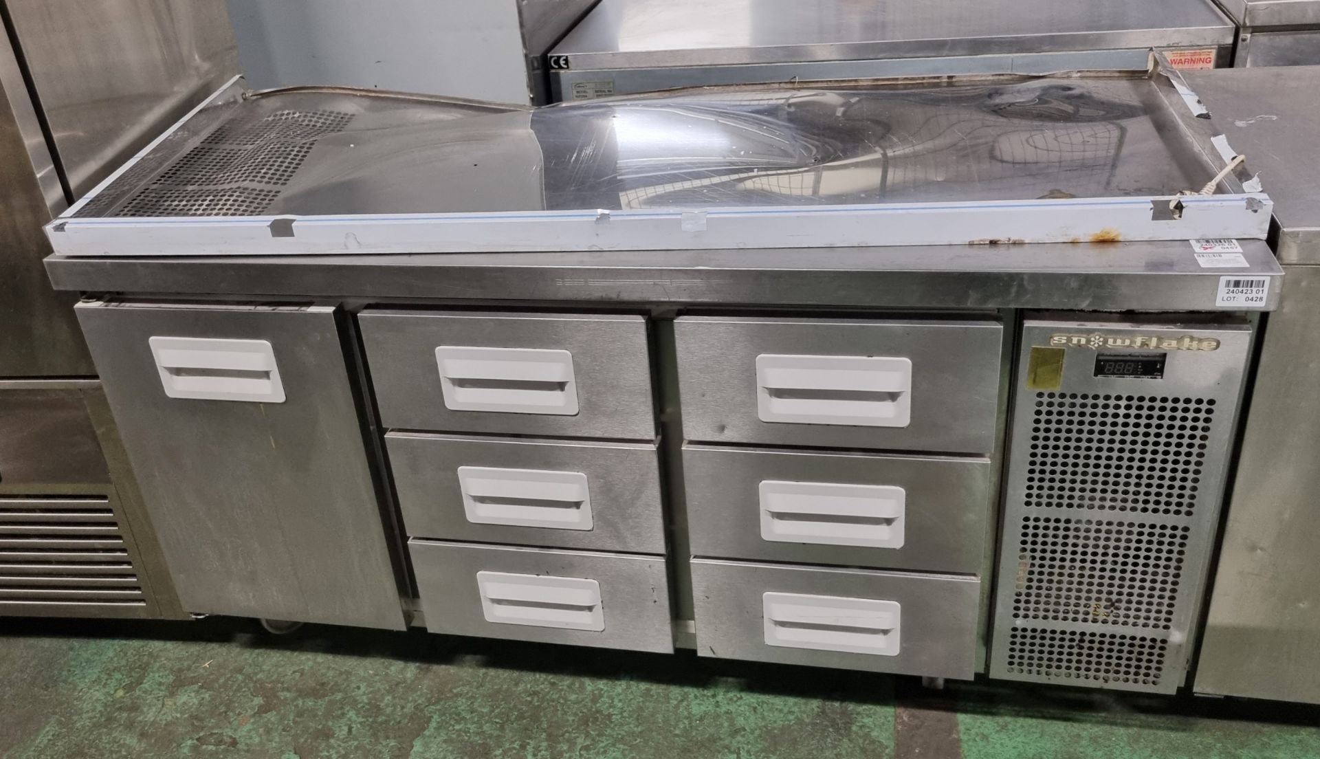 Hoshizaki Snowflake refrigerated preparation counter with storage drawers - back plate broken