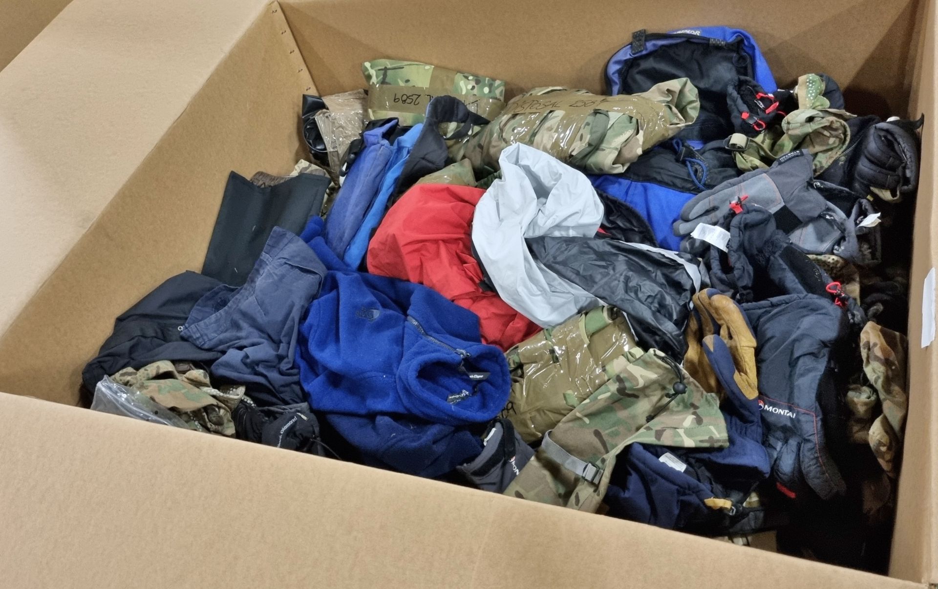 Various types of ex-military clothing The asset shows significant, irreparable damage - 115kg