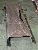 Folding field stretcher - ripped canvas