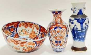A group of Asian ceramics comprising an Imari porcelain scalloped bowl with floral panel decoration