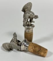 A pair of silver cast Capercaillie cork mounted bottle stoppers, (H x 12 cm) (2)