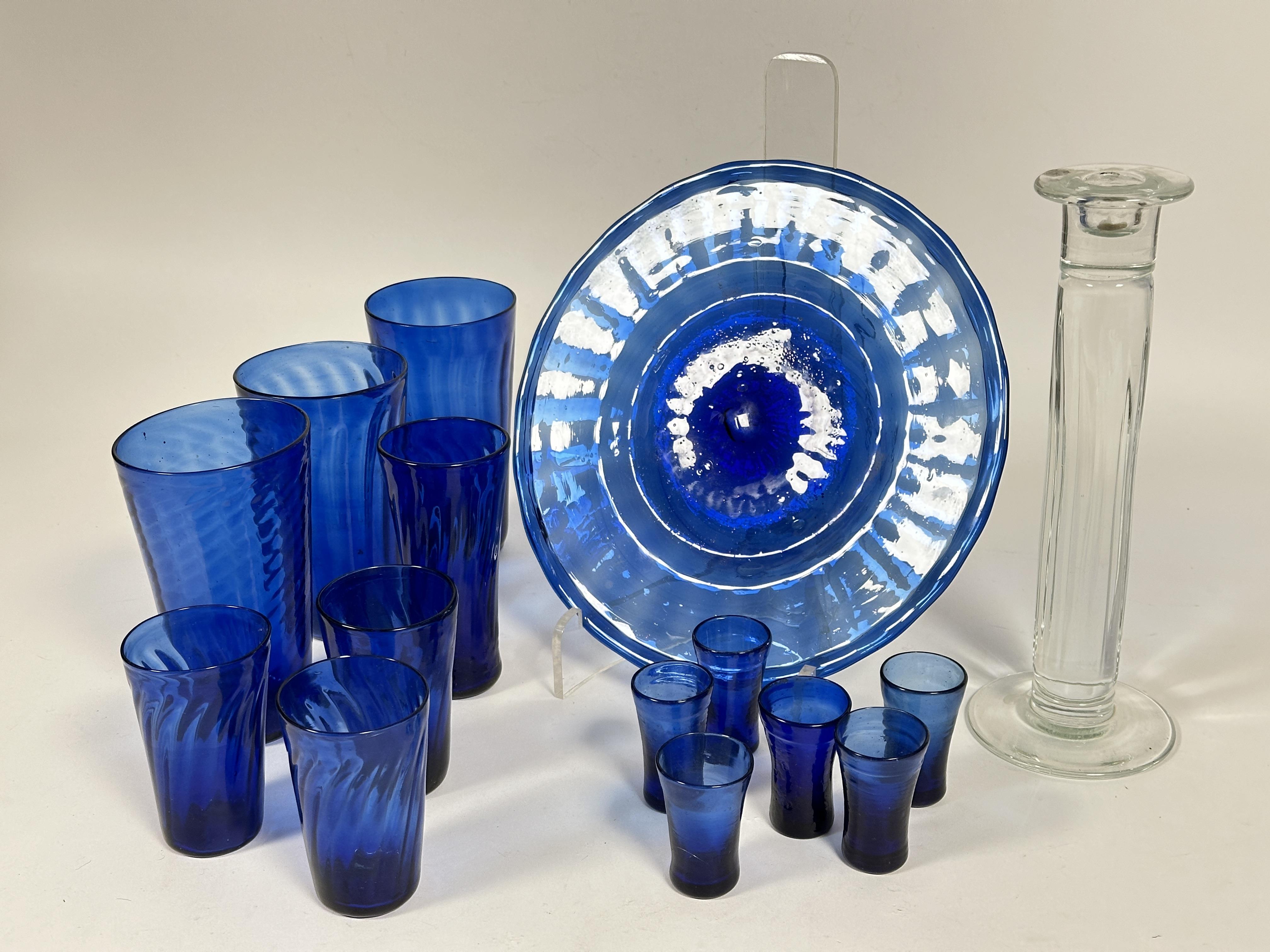 A part set of Bristol blue spiral glass ware including three large tumblers, (H x 15 cm), three