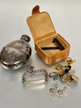An Edwardian Epns oval engraved hip flask with screw top top and removable base, (L x  12.5 cm), a