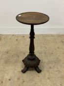 A 19th century and later mahogany pedestal table, the circular dished top raised on a water leaf