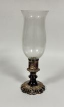 An Epns circular column storm lamp with chased scalloped base complete with glass shade, (H x 34