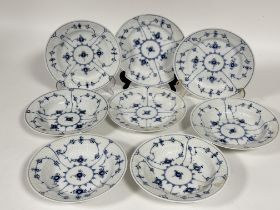 A part set of Danish Royal Copenhagen porcelain  blue and white fluted dessert bowl, one with chip