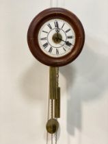 A late 19th / early 20th century postmans alarm clock, the white enamel dial with Roman chapter