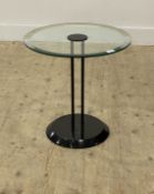 Attributed to Vico Magistretti, A Hollywood Regency style coffee table, the circular glass top
