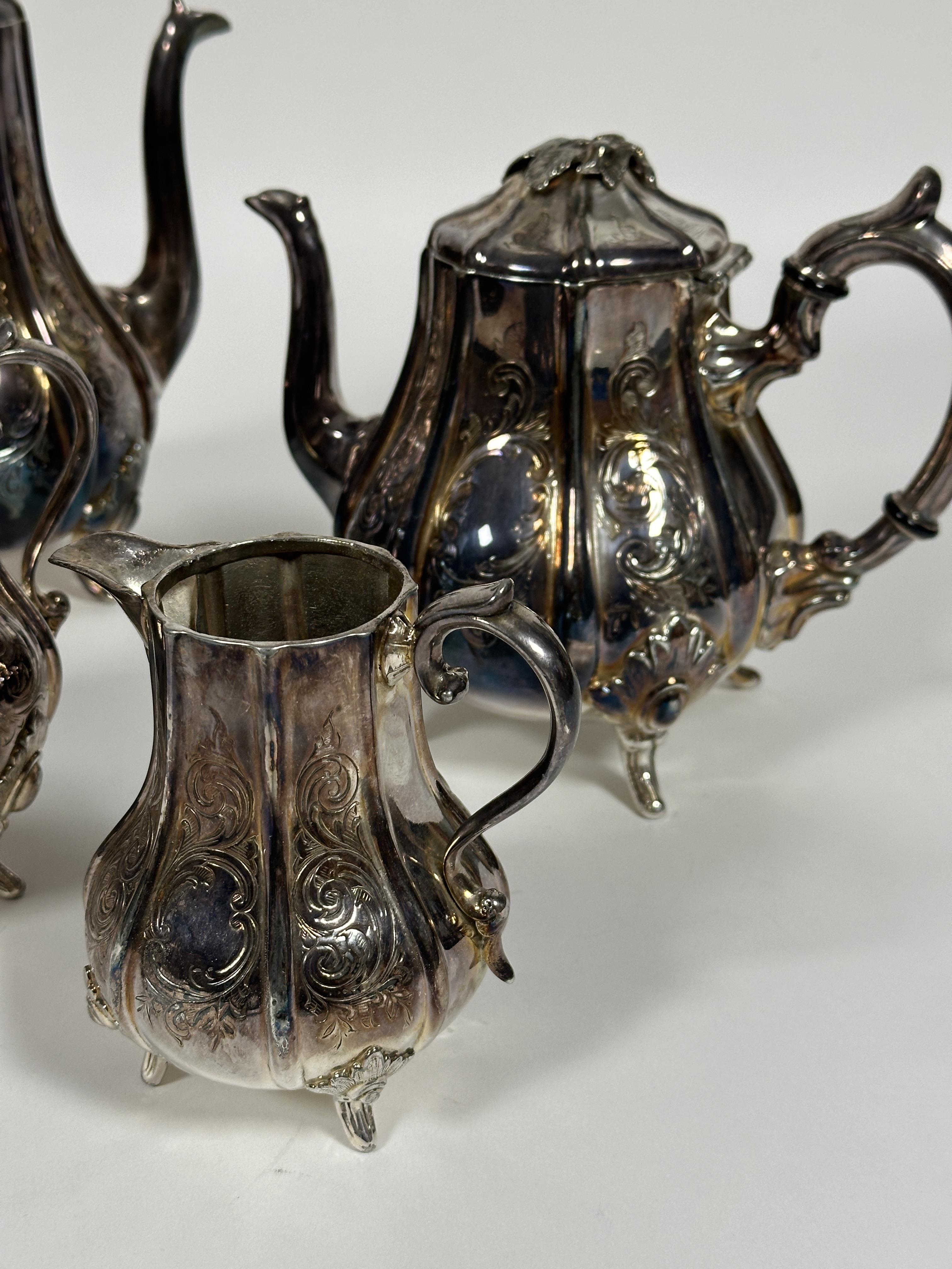 An Edwardian Epns panel sided baluster four piece tea service including, tea and coffee pots, two - Image 2 of 3