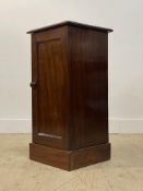 A 19th century mahogany pedestal bedside cabinet, with single panelled door enclosing a shelf,