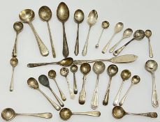 A group of hallmarked silver condiment spoons, pastry fork etc... some with engraved monogrammes (a