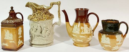 A group of salt glazed stoneware comprising a Royal Doulton jug/pitcher glazed in green with sprigge