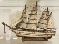 A painted treen model of a three masted sailing ship, mid 20th century L43ccm
