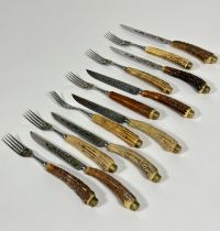 A  Anton Wingen Jnr German set of six pairs of engraved stainless steel blades and stag horn handled