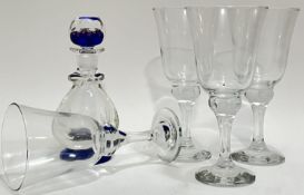 A mixe group of glassware comprising four clear glass stemmed drinking glasses (h- 21cm) and a Perth