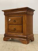 A stained cherry wood chest, fitted with two drawers, raised on bracket supports. H78cm, D73cm,