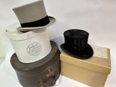 A Lock & Co morning hat ( L x 20 cm x W 16 cm), a Lock & Co black silk top hat, (L x 20 x W x 16
