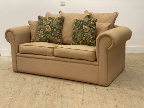A traditional upholstered two seat sofa bed. H72cm, W174cm, D100cm.