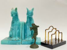 A pair of turquoise glazed bookends modelled as cats (h- 22cm), together with a letter rack and a ca