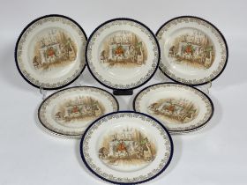 A set of eight Crown E Ducal Sam Weller transfer printed dinner plates enclosed with gilt and blue