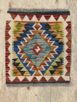 A Chobi kilim mat of geometric design 57cm x 46cm