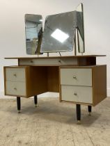 G-Plan Librenza, a mid century oak dressing chest, with triple swing mirror above a combination of