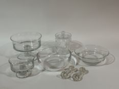 A collection of glass-wares comprising a pair of knife rests, a glass with beaded decoration bowl (