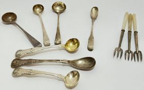 A group of silver caddy/condiment spoons, mainly Edinburgh hallmarked, including Millidge & Son,