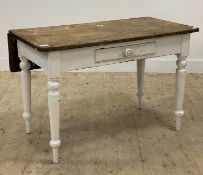 A Victorian pine kitchen table, the top with drop leaf verso, above a drawer and raised on turned