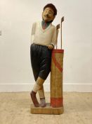 A large carved and painted figural model, depicting a golfer with bag and clubs H130cm.