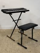 A Yamaha PSR-210 electric key board, complete with folding stand, carry case, power leaf and stool