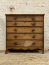 A George III mahogany inlaid secretaire chest, the cross banded top above a pull out drawer with