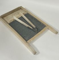 A vintage Special pine zinc corrugated wash board and pair of tongs (H x 58 cm x W x 33 cm) (2)
